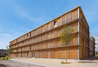 Collegium Academicum, Heidelberg Foto des Collegium Academicums in Heidelberg. Man sieht ein Gebäude aus Holz.